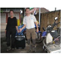 Chris and Elke with suitcases of souvenirs.jpg